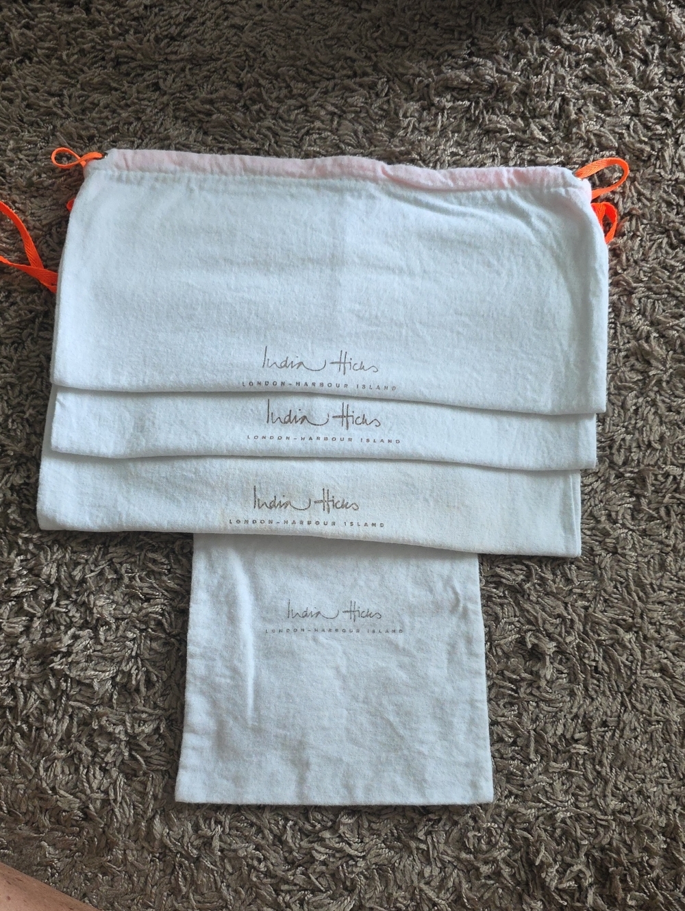4 India Hicks White Linen Pouches with Tan Logo Print
